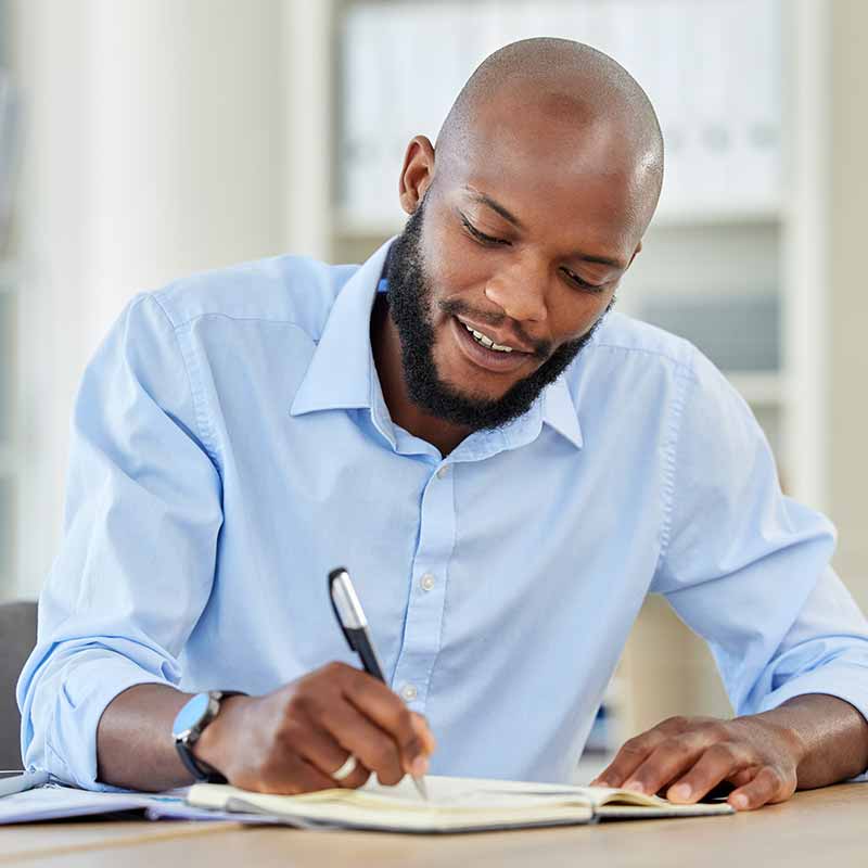 African american man filling out iv therapy health forms